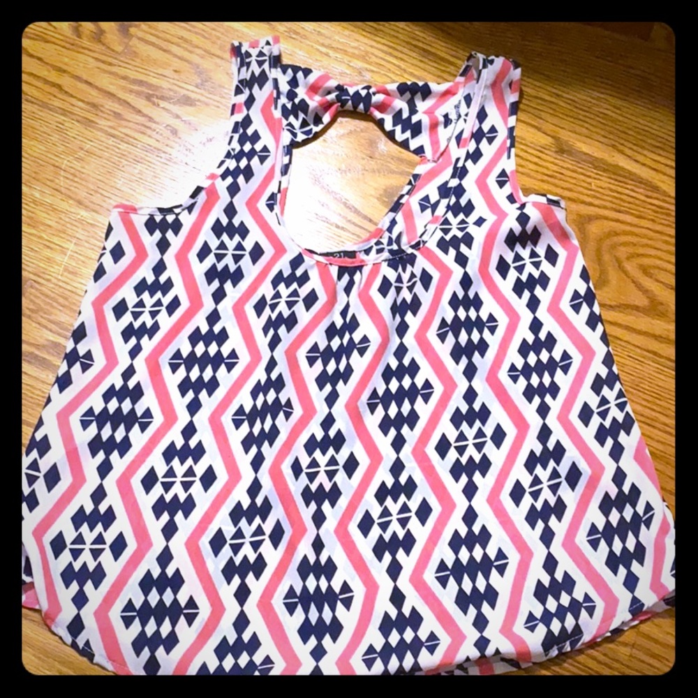 A colorful patterned tank top, worn a few times
